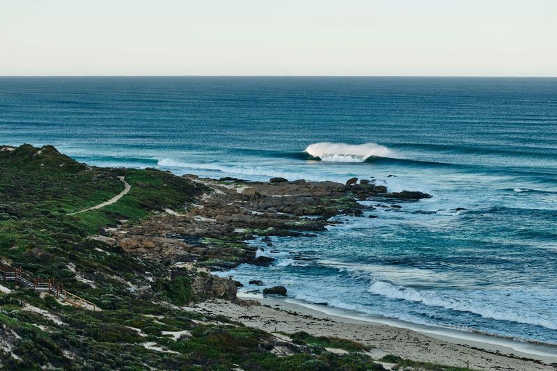 Blue swell rolling past a coastal headland, Gas Bay, Margaret River
