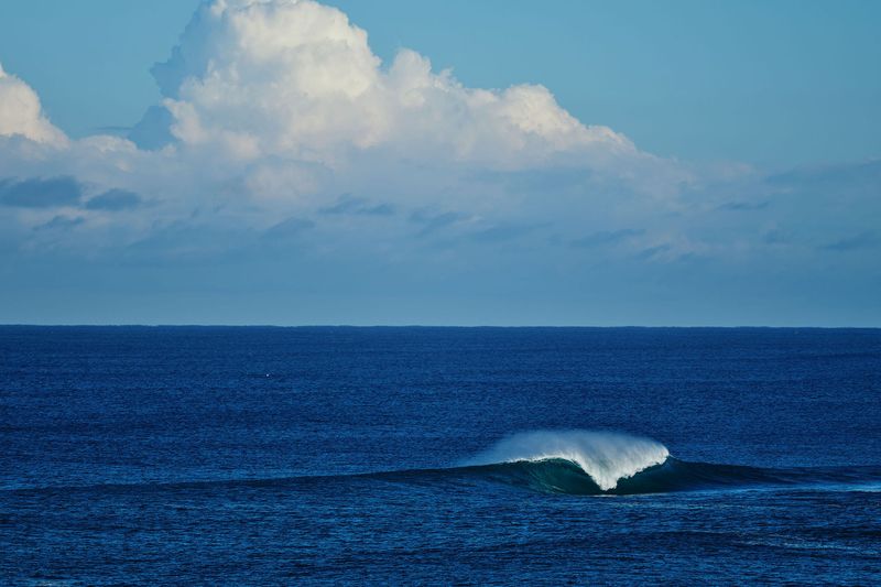 Lone wave breaking on a deep blue ocean, Main Break, Margaret River