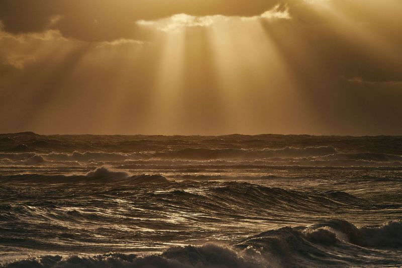 Light rays over a dark rolling sea, Main Break, Margaret River
